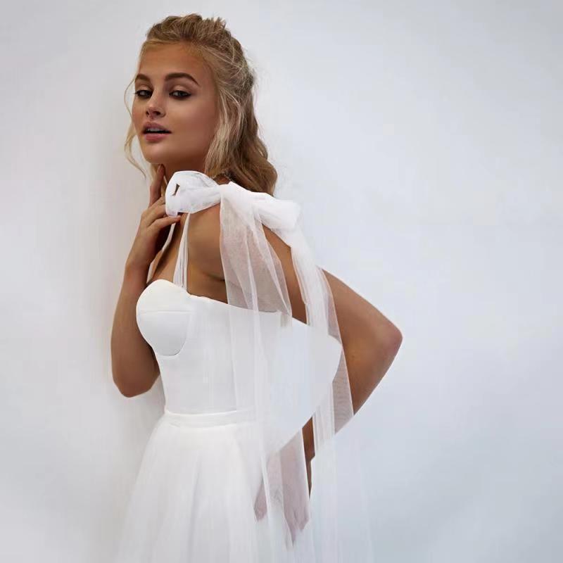 French-style Strapless Wedding Dress With A Bow Featuring A Tulle Train - Image 2