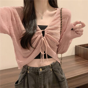 Knitted cardigan with lace pattern